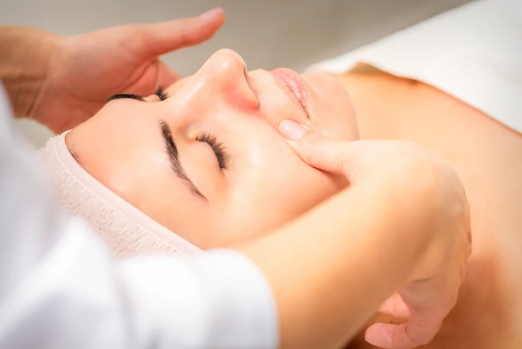 A woman receiving a Lymphatic Massage in Atlanta, GA, at Gentle Giant Care