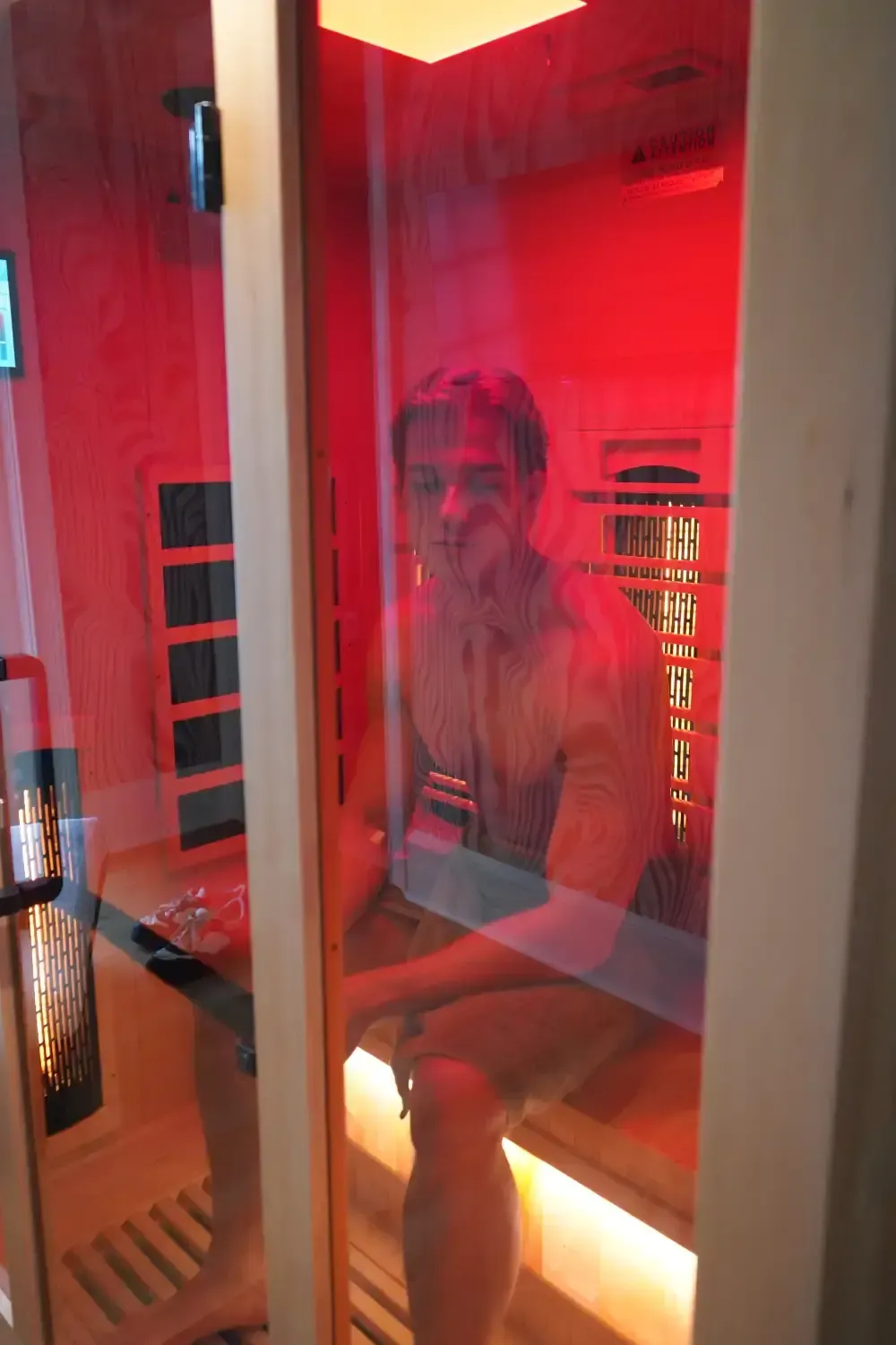 A man receiving Red Light Therapy