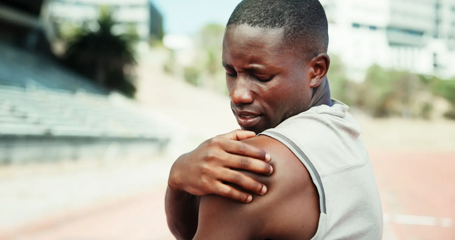 A man has pain in his left shoulder